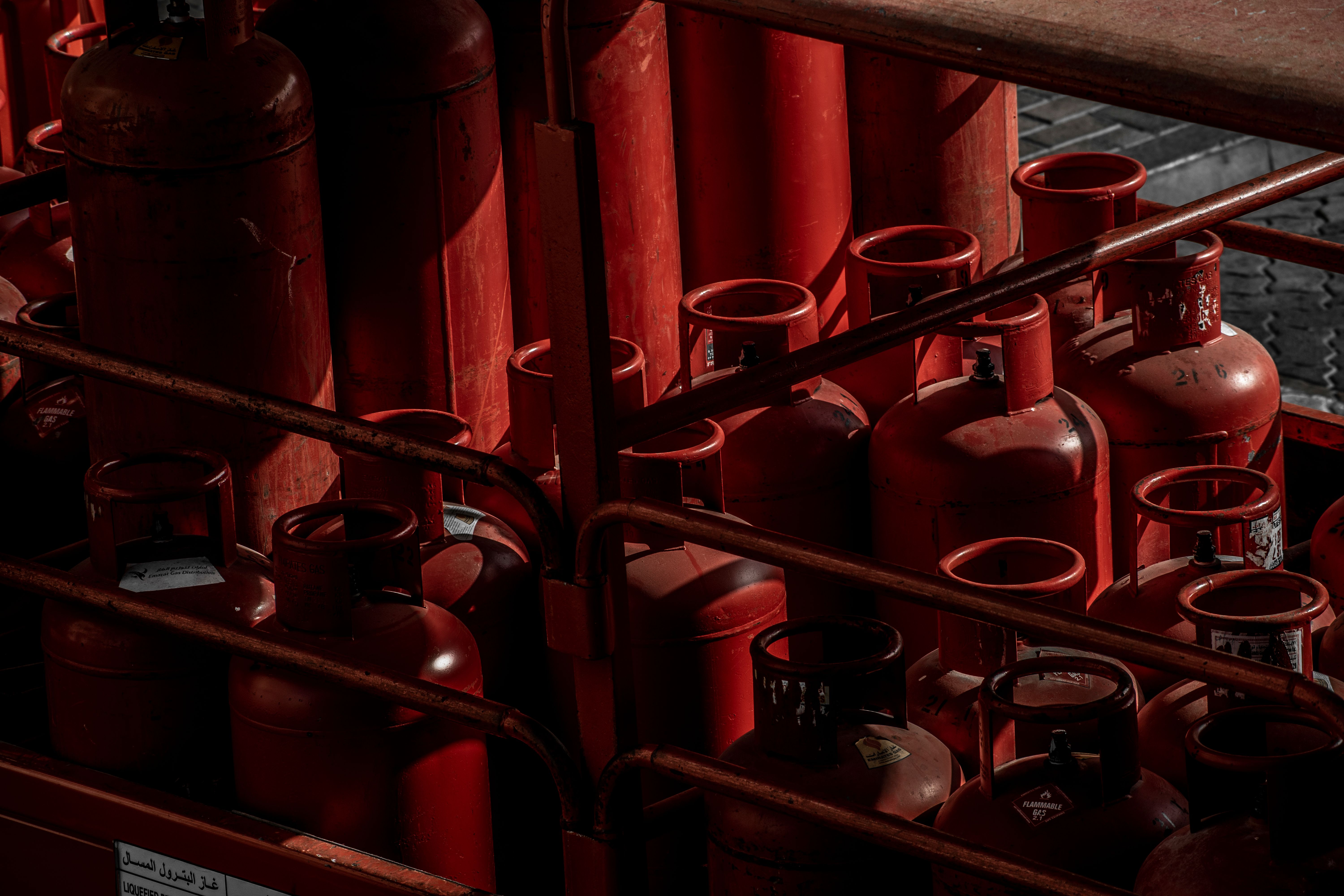 Gas cylinders racked in rows at a filling depot